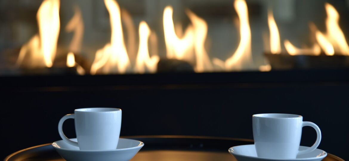Fireside coffee or tea in home or cafe