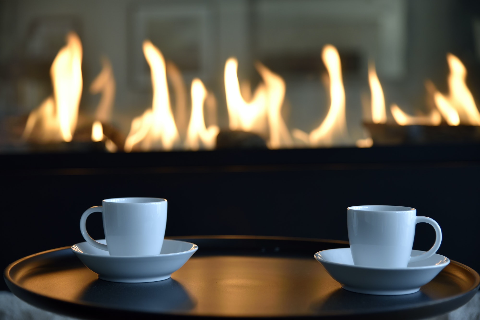 Fireside coffee or tea in home or cafe